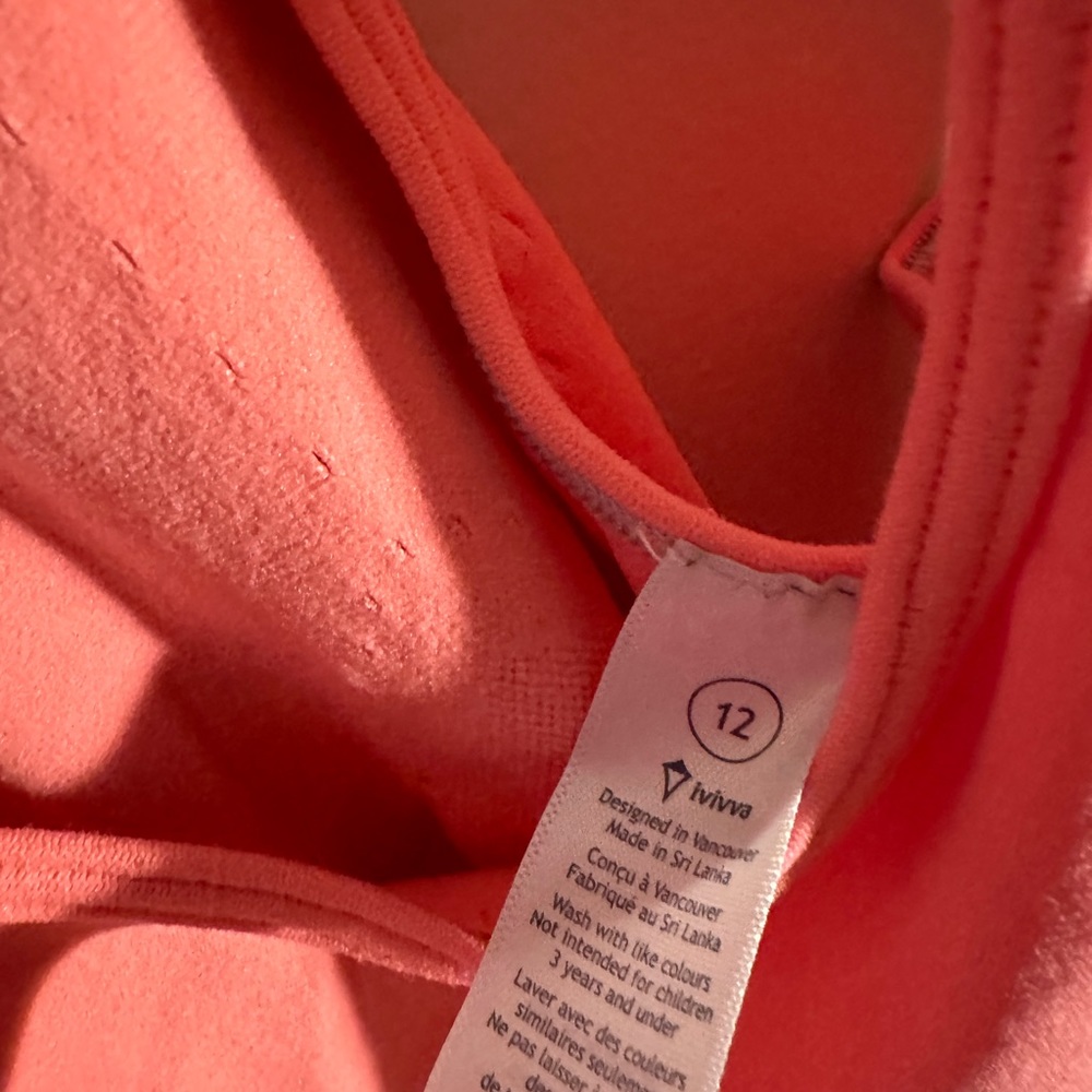 Girls 12 women xs Ivivva/Lululemon coral tank top.